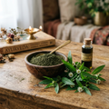 Pure Bhringraj Brangraj Powder in wooden bowl with fresh bhringraj leaves and flowers
